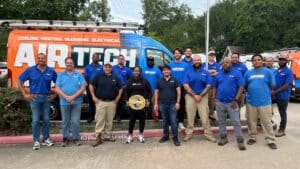 AirTech Team in Front of Truck with Belt